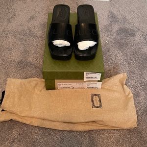 Black Gucci rubber slides